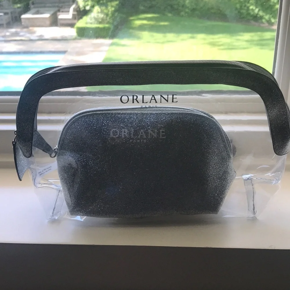 NWOT Orlane Paris cosmetic bags in sparkly silver